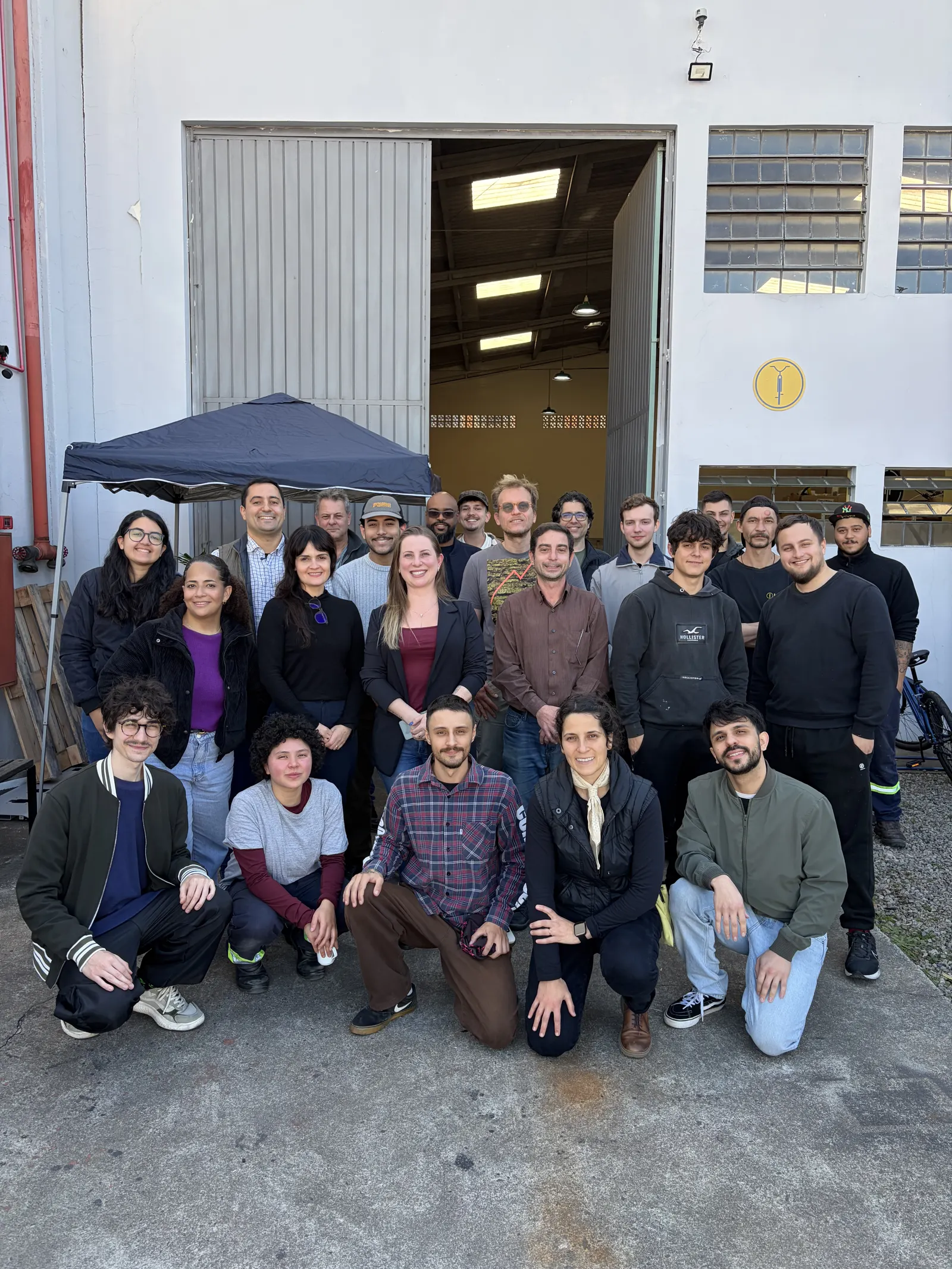 The Bike Fácil team gathered in front of the factory